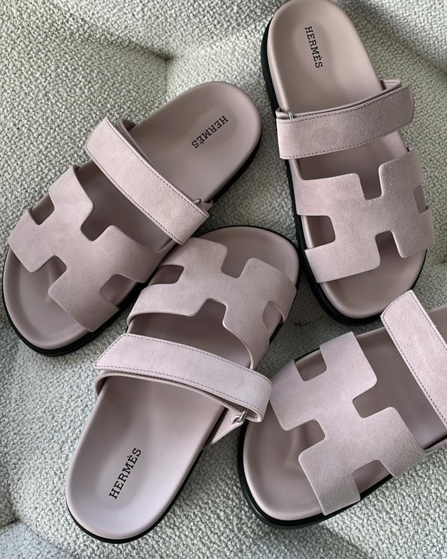 Two pairs of pale pink Hermès Chypre sandals